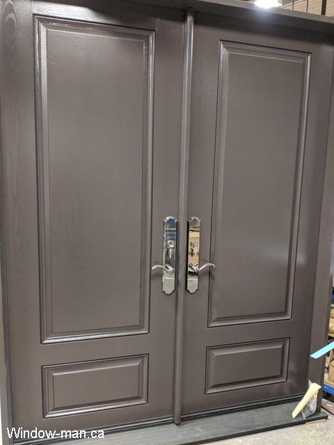 Fiberglass double front entry exterior doors. Painted both sides the same color. High 8 foot doors. Multi point lock